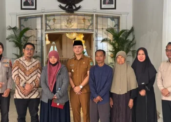 KP2MI menegaskan desa menjadi garda pertama pelindungan PMI, dengan remitansi PMI mencapai Rp288 triliun.