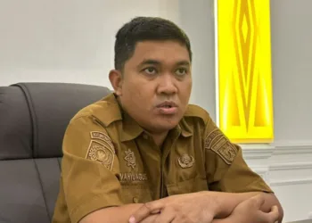 Kepala Dinas Komunikasi, Informatika, Persandian dan Statistik (Diskominfosantik) Provinsi Sulteng Wahyu Agus Pratama, ketika dimintai keterangan mengenai program Berani Berdering, Selasa (25/8/2026). (Lingkar.news Network)