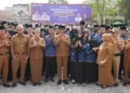 Pelantikan ASN Sulteng, Anwar Hafid Tekankan Meritokrasi dan Loyalitas 2 Gubernur Sulawesi Tengah Anwar Hafid (tengah) foto bersama dengan para ASN yang baru saja dilantik, beserta jajarannya, Selasa (13/10/2026). (Lingkar.news Network)