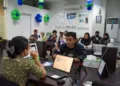 BPJS Kesehatan menghadapi kesenjangan cash flow Rp14 triliun, sementara 52 juta peserta belum aktif membayar iuran.