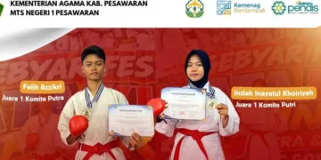 Dua pelajar MTsN 1 Pesawaran meraih juara karate tingkat nasional dalam kejuaraan karate terbuka DOJO OKC GRJU.